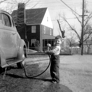 boy washing 1936 chevy coupe